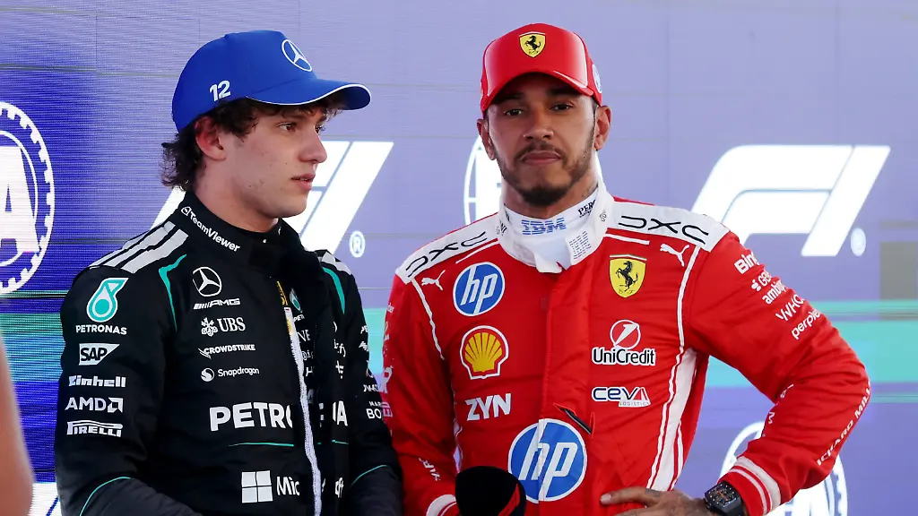 Formula-One-F1-Barcelona-Catalunya-Grand-Prix-Circuit-de-Barcelona-Catalunya-Barcelona-Spain-June-13-2026-Second-placed-Ferrari-s-Lewis-Hamilton-reacts-alongside-third-placed-Mercedes-Andrea-Kimi-Antonelli-after-qualifying-REUTERS-Bruna-Casas