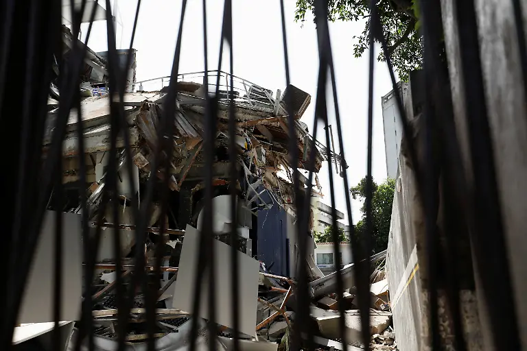 A-view-of-the-remains-of-a-building-damaged-by-earthquakes-that-hit-the-country-in-Caracas-Venezuela-June-25-2026
