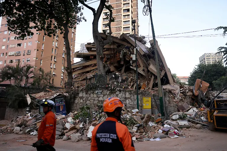 Emergency-services-work-at-the-site-of-a-collapsed-building-after-earthquakes-hit-the-country-in-Caracas-Venezuela-June-25-2026