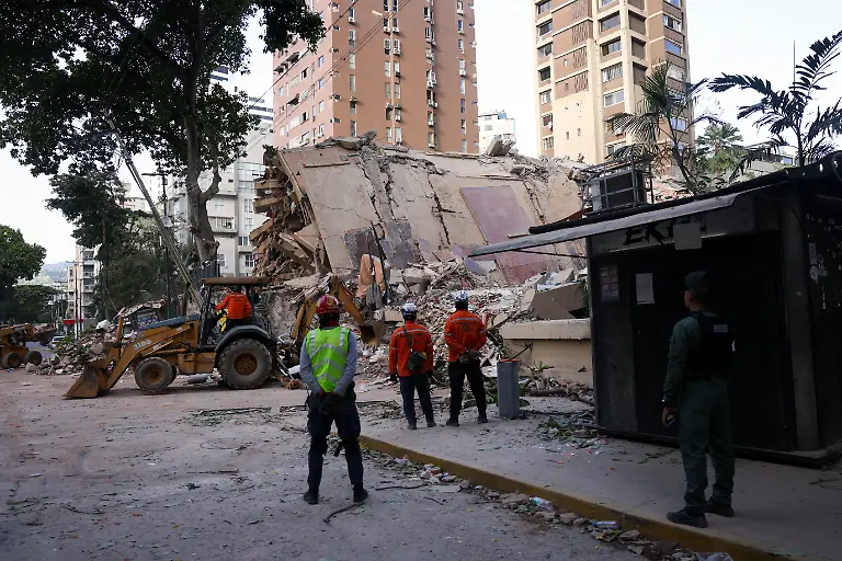 Emergency-services-work-at-the-site-of-a-collapsed-building-after-earthquakes-hit-the-country-in-Caracas-Venezuela-June-25-2026