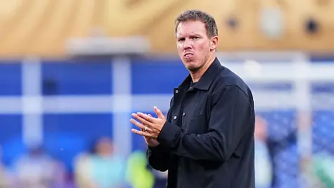 Germany-head-coach-Julian-Nagelsmann-claps-hands-to-supporters-after-losing-the-World-Cup-round-of-32-soccer-match-between-Germany-and-Paraguay-in-Foxborough-Mass-near-Boston-Monday-June-29-2026