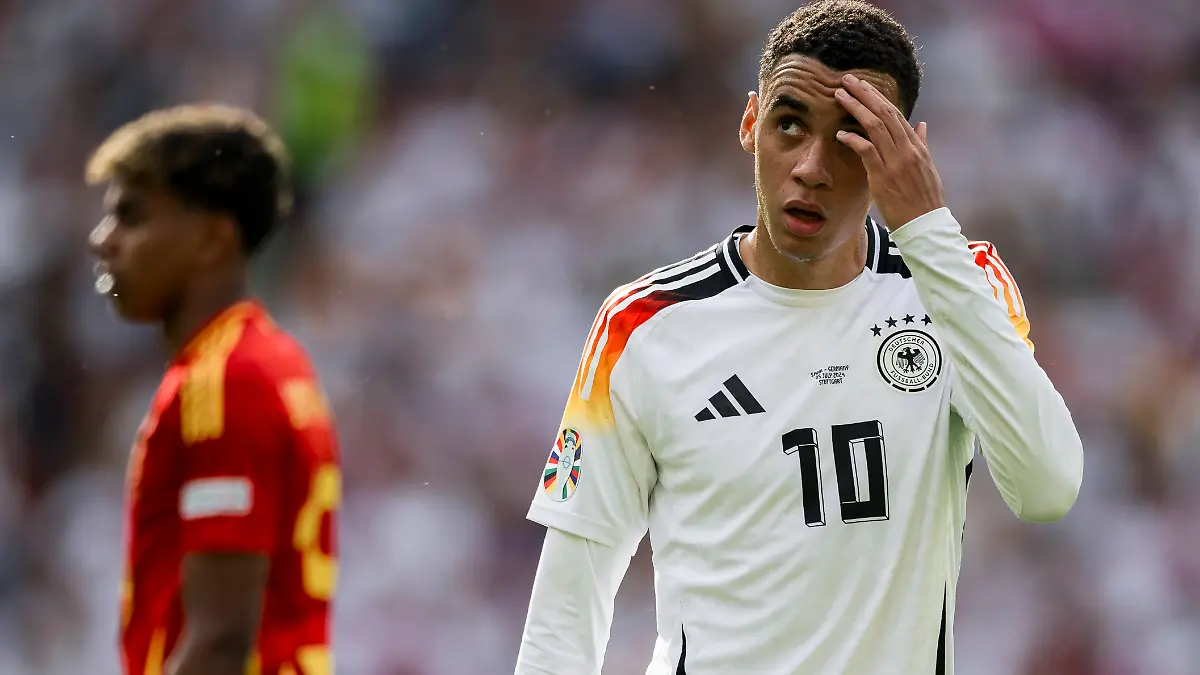 Spain-v-Germany-UEFA-EURO-EM-Europameisterschaft-Fussball-2024-Jamal-Musiala-of-Germany-looks-on-next-to-Lamine-Yamal-of-Spain-during-the-UEFA-EURO-2024-quarter-final-football-match-between-Spain-and-Germany