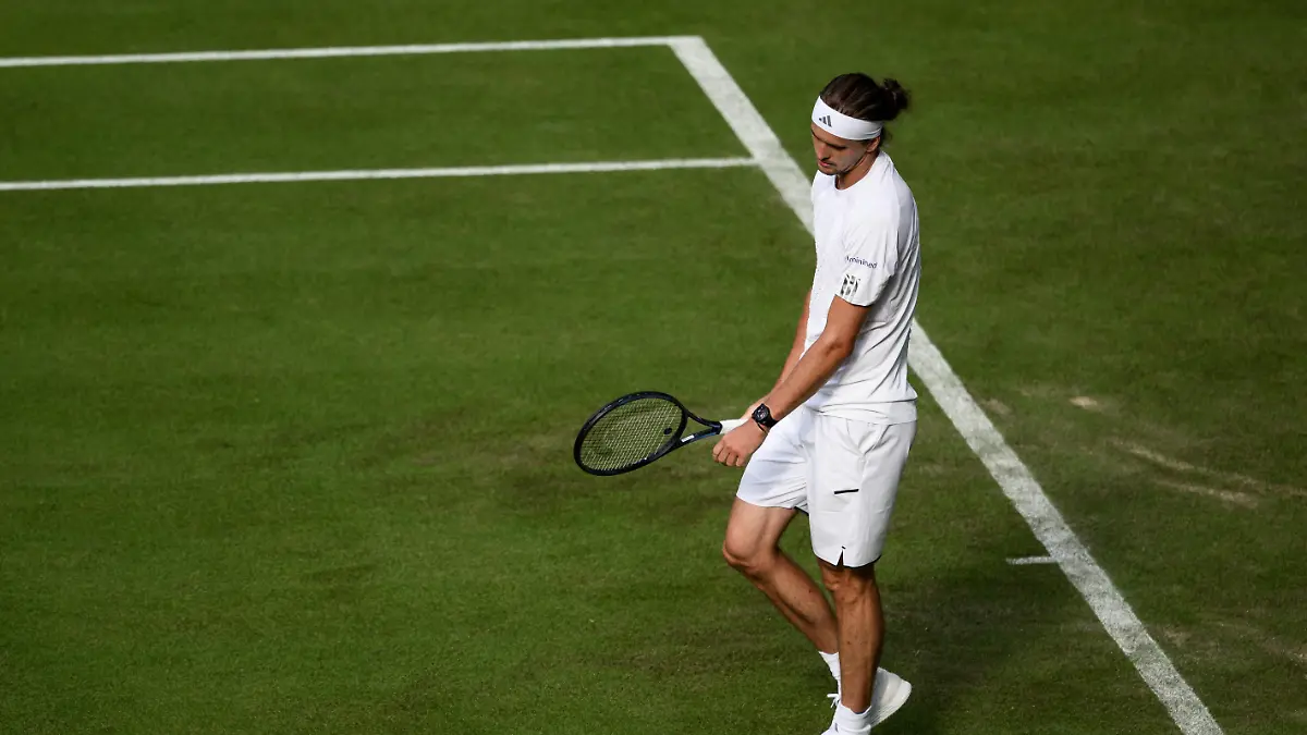 260630-Alexander-Zverev-of-Germany-looks-dejected-as-he-competes-in-a-first-round-mens-singles-match-during-day-2-of-Wimbledon-on-June-30-2026-in-London
