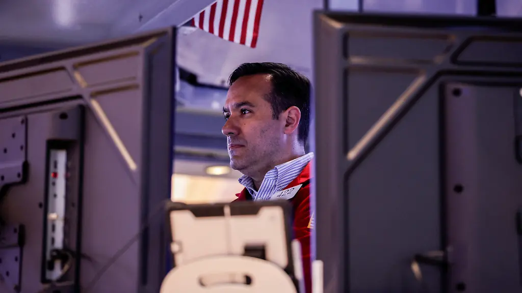 A-trader-works-on-the-floor-at-the-New-York-Stock-Exchange-NYSE-in-New-York-City-U-S-June-18-2026