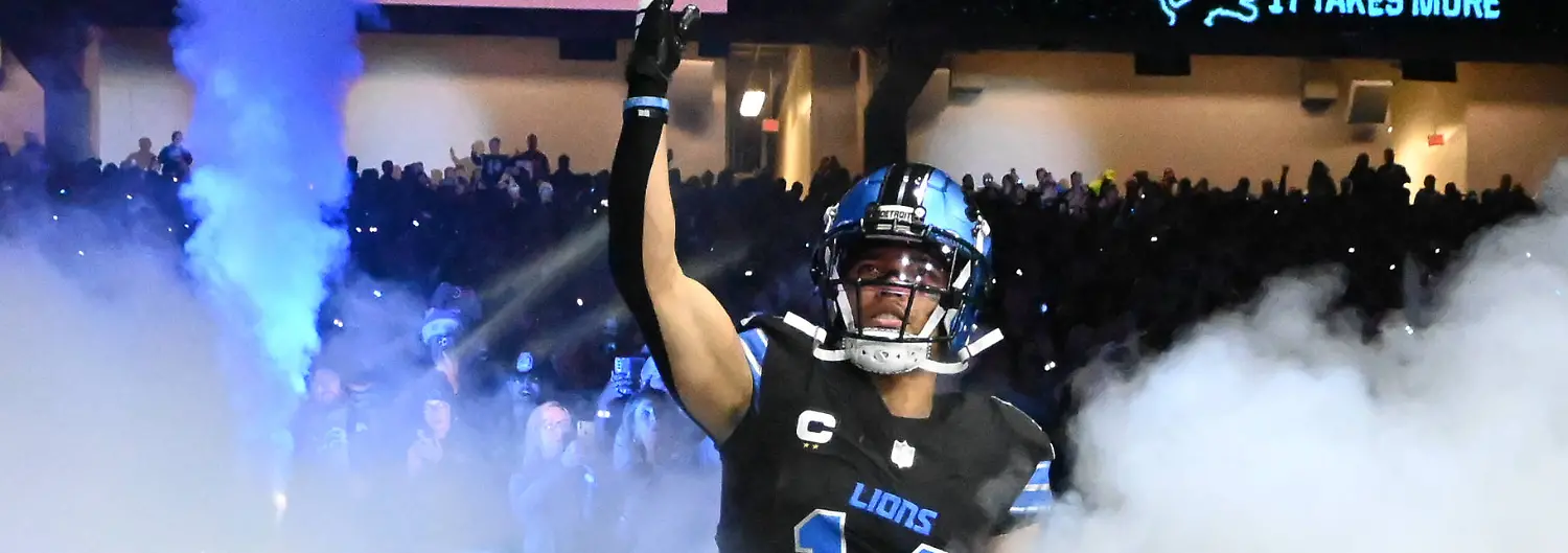DETROIT-MI-DECEMBER-15-Detroit-Lions-wide-receiver-Amon-Ra-St-Brown-14-is-introduced-during-pregame-ceremonies-prior-to-the-Detroit-Lions-versus-the-Buffalo-Bills-game-on-Sunday-December-15-2024-at-Ford-Field-in-Detroit-MI