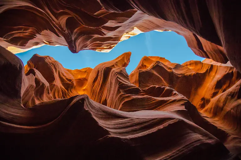 Low-angle-view-of-layered-red-rock-inside-slot-canyon-Page-Arizona-USA-CR-JDIP26060856-2046597-01