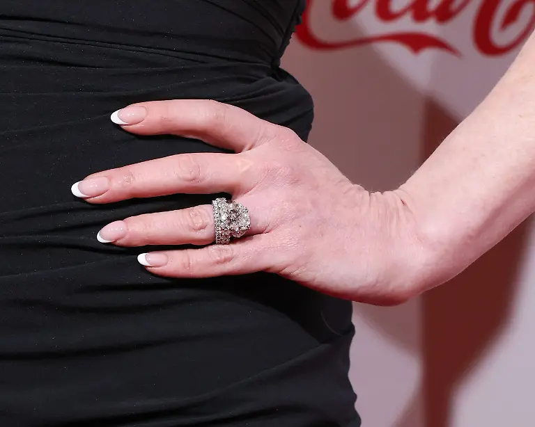 CinemaCon-Big-Screen-Achievement-Awards-2025-LAS-VEGAS-NEVADA-USA-APRIL-03-American-actress-and-singer-Lindsay-Lohan-Bader-Shammas-wedding-ring-detail-recipient-of-the-CinemaCon-Vanguard-Award-arrives-at-the-CinemaCon-Big-Screen-Achievement-Awards-2025-held-at-Omnia-Nightclub-at-Caesars-Palace-CinemaCon-is-the-official-convention-of-Cinema-United-formerly-the-National-Association-of-Theatre-Owners-on-April-3-2025-in-Las-Vegas-Nevada-United-States
