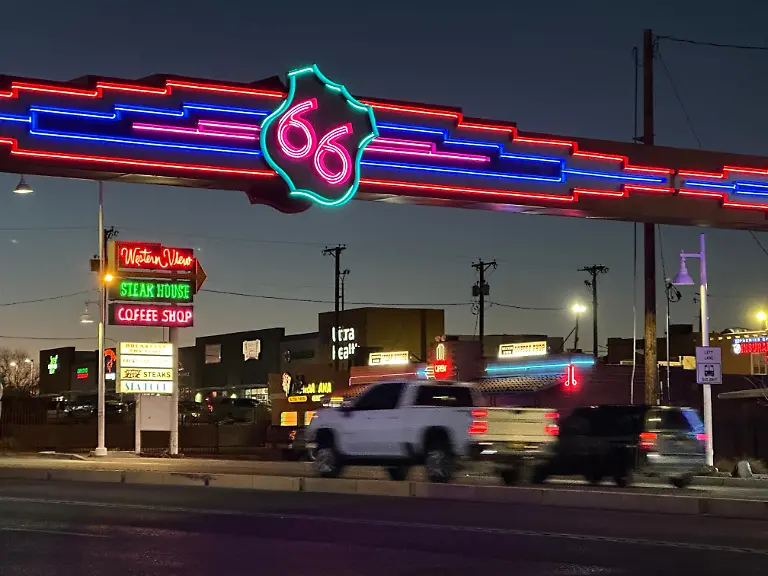 Traffic-passes-under-a-neon-Route-66-sign-on-the-west-end-of-Albuquerque-New-Mexico-Friday-Jan-16-2026