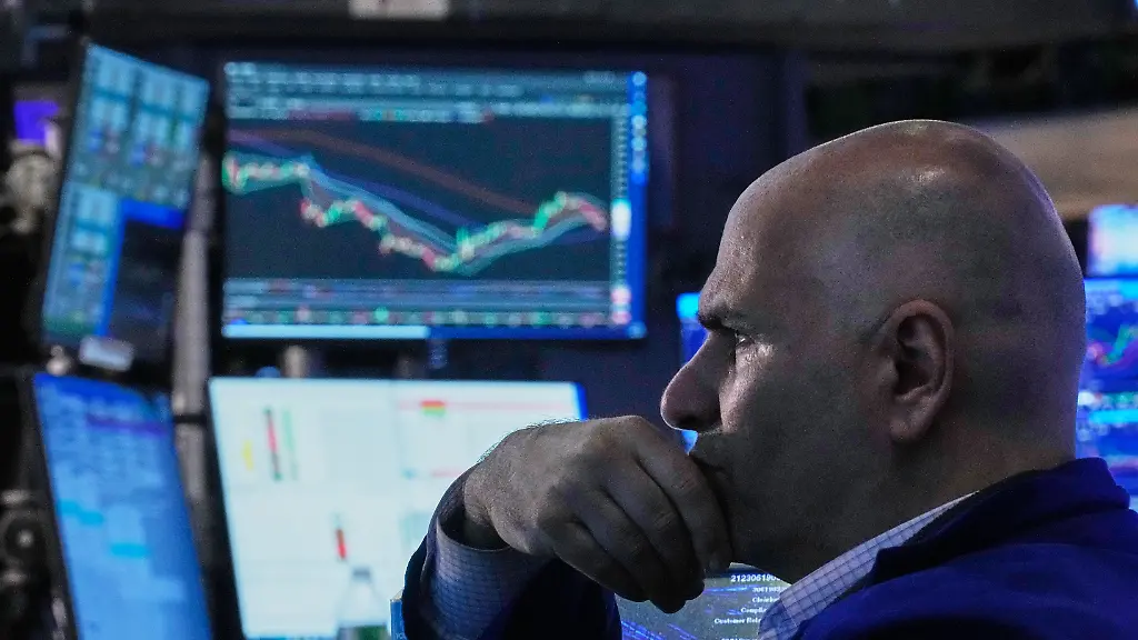 Specialist-Philip-Finale-works-on-the-floor-of-the-New-York-Stock-Exchange-Friday-June-26-2026