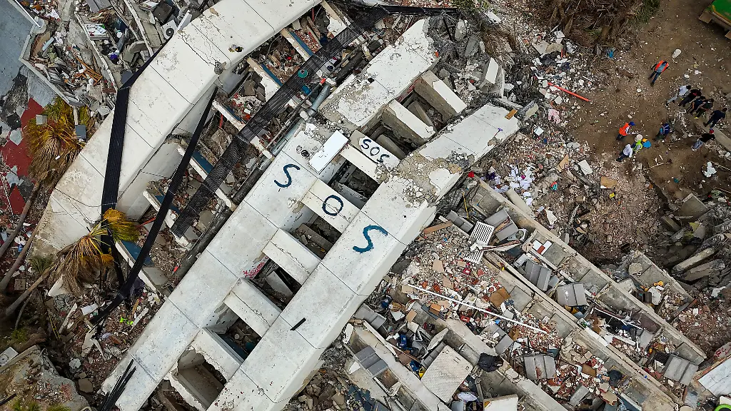 SOS-is-seen-on-collapsed-buildings-following-the-June-24-twin-earthquakes-in-Caraballeda-in-the-state-of-La-Guaira-Venezuela-Thursday-July-2-2026