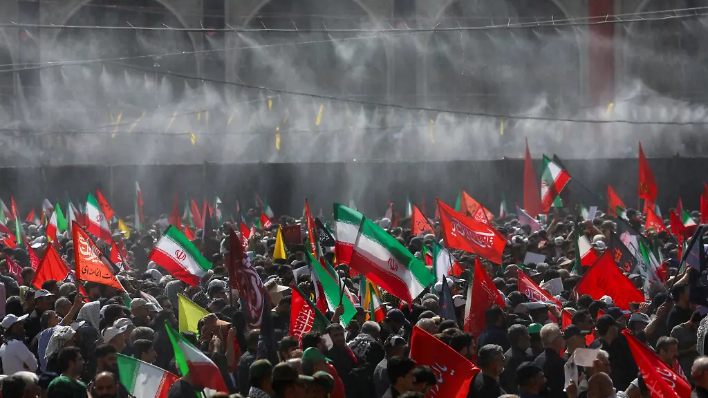 Water-is-sprayed-on-people-attending-a-public-farewell-ceremony-to-pay-their-respects-to-late-Supreme-Leader-Ayatollah-Ali-Khamenei-who-was-killed-on-February-28-in-Israeli-and-U-S-airstrikes-at-the-Imam-Khomeini-Grand-Mosalla-in-Tehran-Iran-July-4-2026-REUTERS-Murad-Sezer-Foreign-media-in-Iran-operate-under-guidelines-set-by-the-Ministry-of-Culture-and-Islamic-Guidance-which-regulates-press-activity-and-permissions-ISRAEL-OUT-NO-COMMERCIAL-OR-EDITORIAL-SALES-IN-ISRAEL-NO-ACCESS-FOR-ISRAELI-MEDIA-NO-USE-BBC-PERSIAN-NO-USE-VOA-PERSIAN-NO-USE-MANOTO-NO-USE-IRAN-INTERNATIONAL-NO-USE-RADIO-FARDA-DIGITAL-NO-USE-BBC-PERSIAN-NO-USE-VOA-PERSIAN-NO-USE-MANOTO-NO-USE-IRAN-INTERNATIONAL-NO-USE-RADIO-FARDA