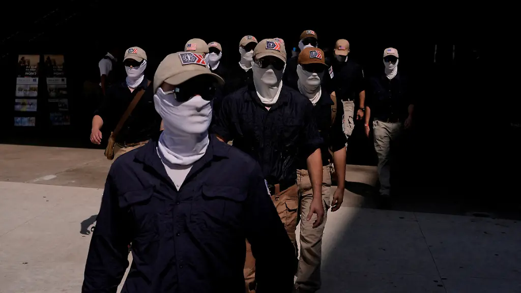 Members-of-the-group-Patriot-Front-exit-a-metro-station-on-the-250th-anniversary-of-U-S-independence-in-New-Carrollton-Maryland-U-S-July-4-2026-REUTERS-Cheney-Orr-REFILE-CORRECTING-LOCATION-FROM-WASHINGTON-D-C-TO-NEW-CARROLLTON-MARYLAND