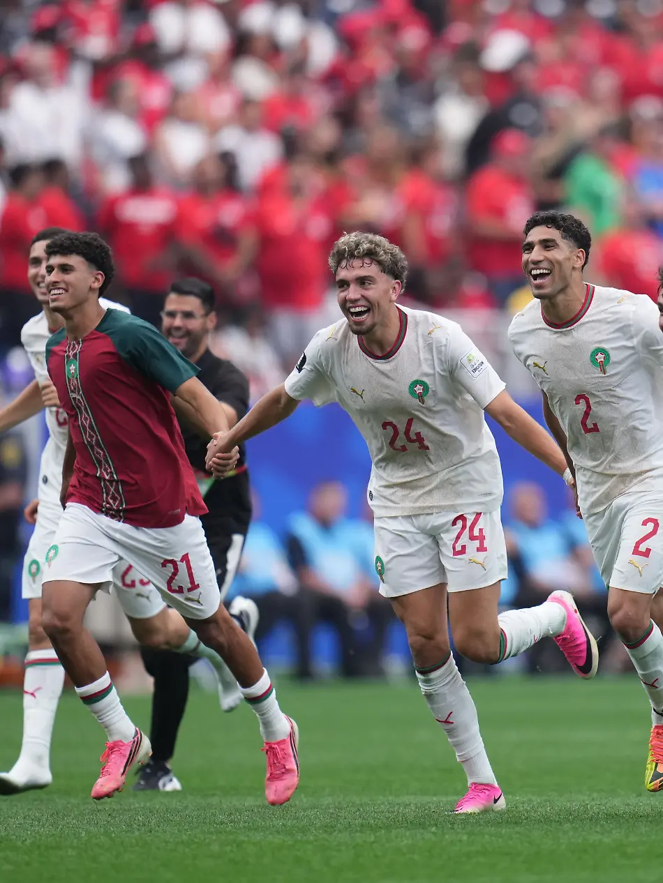 Morocco-players-celebrate-their-win-over-Canada-after-the-World-Cup-round-of-16-soccer-match-between-Canada-and-Morocco-in-Houston-Saturday-July-4-2026