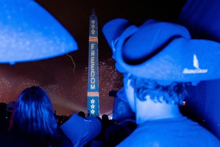 Lightning-strikes-as-people-watch-a-fireworks-display-during-the-Freedom-250-s-Salute-to-America-as-the-United-States-celebrates-its-250th-anniversary-on-Independence-Day-attempting-the-largest-firework-display-in-history-with-850-000-fireworks-in-Washington-D-C-U-S-July-5-2026