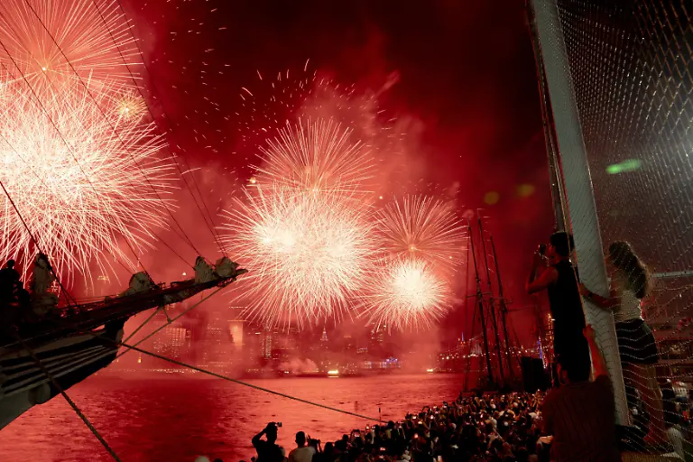 Crowds-enjoy-a-fireworks-show-from-Brooklyn-Bridge-Park-in-the-Brooklyn-borough-of-New-York-Saturday-July-4-2026