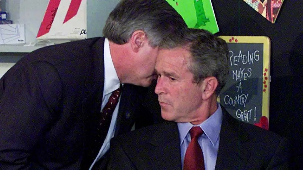 President-Bush-s-Chief-of-Staff-Andy-Card-whispers-into-the-ear-of-the-President-to-give-him-word-of-the-plane-crashes-into-the-World-Trade-Center-during-a-visit-to-the-Emma-E-Booker-Elementary-School-in-Sarasota-Fla-Tuesday-Sept-11-2001