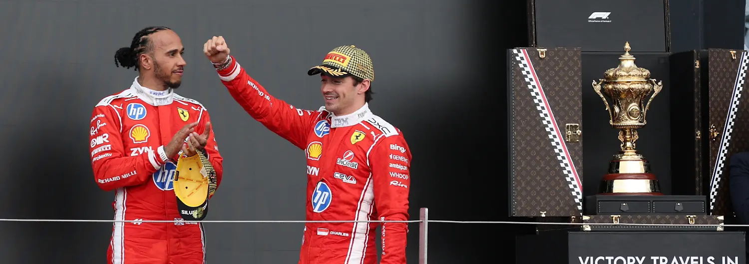 Formula-One-F1-British-Grand-Prix-Silverstone-Circuit-Silverstone-Britain-July-5-2026-Ferrari-s-Charles-Leclerc-celebrates-on-the-podium-after-winning-the-British-Grand-Prix-with-Ferrari-s-Lewis-Hamilton-who-finished-in-third-place-REUTERS-Andrew-Boyers