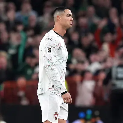 Republic-of-Ireland-v-Portugal-2026-FIFA-World-Cup-European-Qualifying-Aviva-Stadium-Portugal-s-Cristiano-Ronaldo-hands-the-arm-band-to-team-mate-Bernardo-Silva-after-being-shown-a-red-card-during-the-2026-FIFA-World-Cup-European-Qualifying-Group-F-match-at-the-Aviva-Stadium-in-Dublin-Ireland-Picture-date-Thursday-November-13-2025-Photo-credit-should-read-Niall-Carson-PA-Wire-RESTRICTIONS-Use-subject-to-restrictions-Editorial-use-only-no-commercial-use-without-prior-consent-from-rights-holder