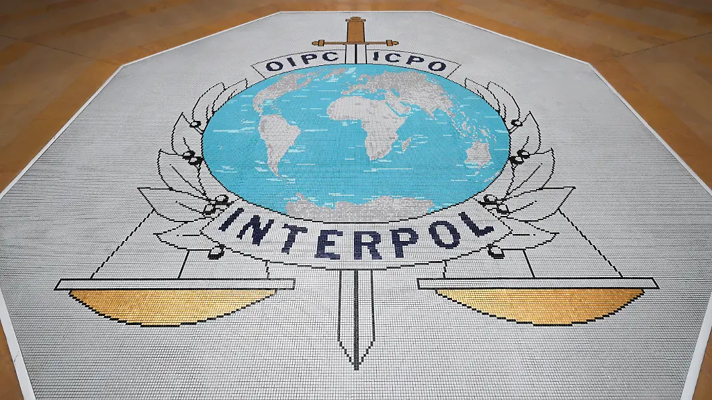 A-sign-at-Interpol-headquarters-where-the-International-Criminal-Police-Organization-an-intergovernmental-body-with-196-member-countries-helps-police-worldwide-work-together-through-cooperation-intelligence-sharing-and-global-alerts-to-combat-cross-border-crime-in-Lyon-France-June-9-2026