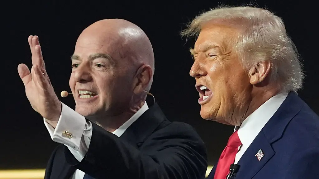 President-Donald-Trump-and-FIFA-President-Gianni-Infantino-react-during-the-draw-for-the-2026-soccer-World-Cup-at-the-Kennedy-Center-in-Washington-Friday-Dec-5-2025