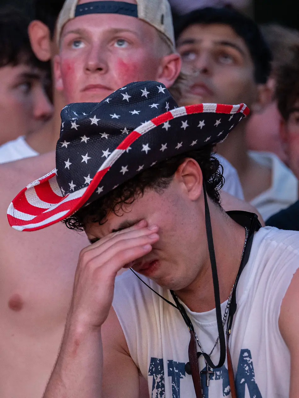 July-6-2026-Washington-District-Of-Columbia-United-States-Fans-react-with-disappointment-as-supporters-watch-Team-USA-fall-to-Belgium-during-a-public-watch-party-on-the-National-Mall-in-Washington-D-C-The-loss-eliminates-the-United-States-from-the-tournament