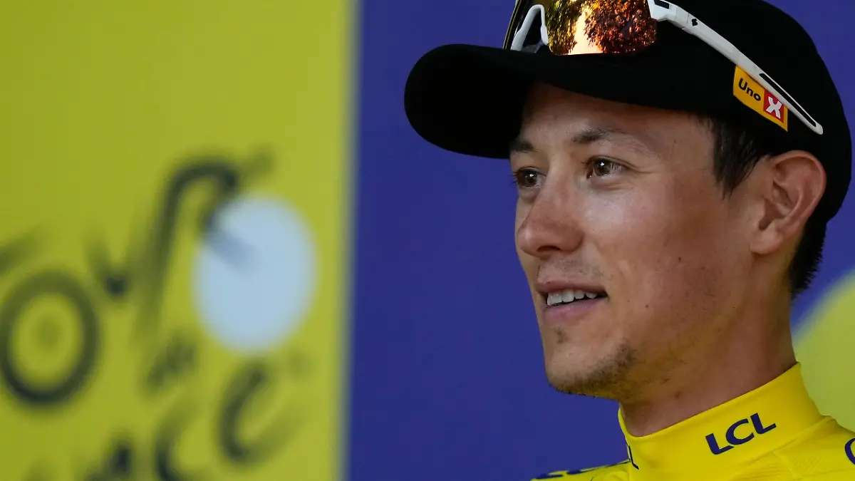 Norway-s-Torstein-Traeen-wearing-the-overall-leader-s-yellow-jersey-celebrates-on-the-podium-after-the-fourth-stage-of-the-Tour-de-France-cycling-race-with-start-in-Carcassonne-and-finish-in-Foix-France-Tuesday-July-7-2026