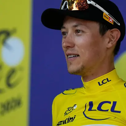 Norway-s-Torstein-Traeen-wearing-the-overall-leader-s-yellow-jersey-celebrates-on-the-podium-after-the-fourth-stage-of-the-Tour-de-France-cycling-race-with-start-in-Carcassonne-and-finish-in-Foix-France-Tuesday-July-7-2026