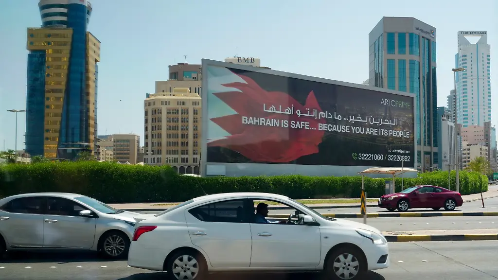 Cars-pass-by-a-billboard-as-U-S-Secretary-of-State-Marco-Rubio-is-in-the-country-to-discuss-an-interim-deal-between-the-U-S-and-Iran-with-Arab-Gulf-allies-in-Manama-Bahrain-Thursday-June-25-2026