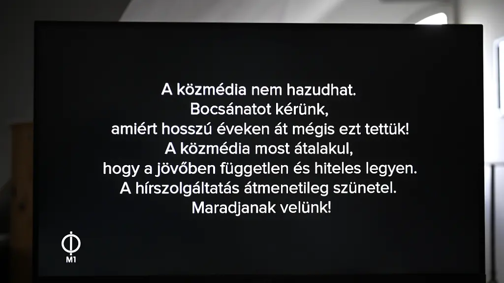 A-monitor-displays-a-live-broadcast-of-M1-the-Hungarian-public-broadcaster-s-news-channel-showing-a-message-that-reads-The-public-media-must-not-lie-We-apologize-for-having-done-so-for-many-years-The-public-media-is-now-being-transformed-so-that-in-the-future-it-will-be-independent-and-trustworthy-News-broadcasting-is-temporarily-suspended-Please-stay-with-us-in-Budapest-Hungary-on-July-7-2026-The-message-appeared-shortly-before-the-channel-was-taken-off-the-air-after-newly-appointed-executives-assumed-control-of-the-broadcaster