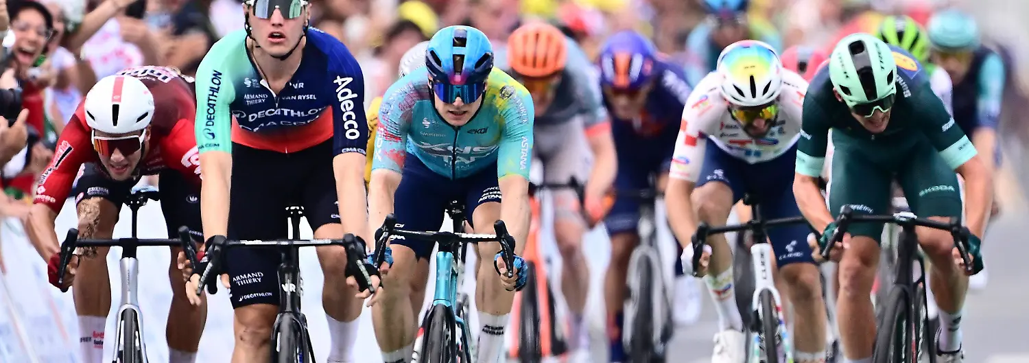 Tour-de-France-2026-Stage-5-PAU-FRANCE-JULY-08-Kooij-Olav-NED-of-Decathlon-CMA-CGM-Team-wins-second-place-for-Kanter-Max-GER-of-XDS-Astana-Team-third-place-for-Merlier-Tim-BEL-of-Soudal-Quick-Step-during-stage-5-of-the-113rd-edition-of-Tour-de-France-an-UCI-World-Tour-2