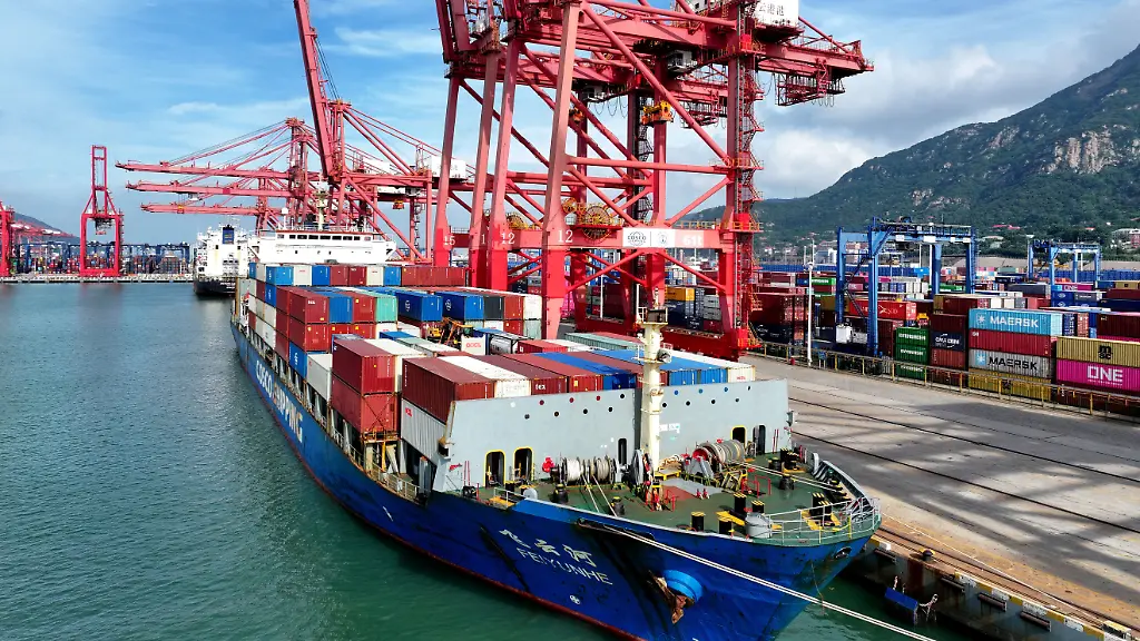 A-cargo-ship-is-parked-at-a-berth-for-loading-and-unloading-containers-at-the-Lianyungang-Port-Container-Terminal-in-Jiangsu-Province-China-on-June-24-2026
