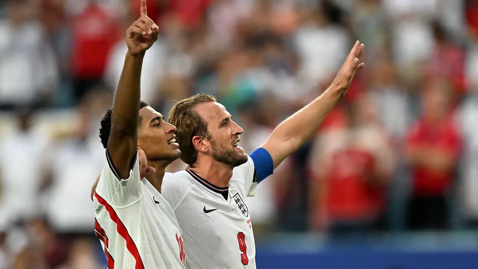 260712-MIAMI-July-12-2026-Xinhua-Harry-Kane-R-and-Jude-Bellingham-of-England-celebrate-after-the-quarter-final-match-between-Norway-and-England-at-the-2026-FIFA-World-Cup-at-the-Miami-Stadium-in-Miami-the-United-States-July-11-2026