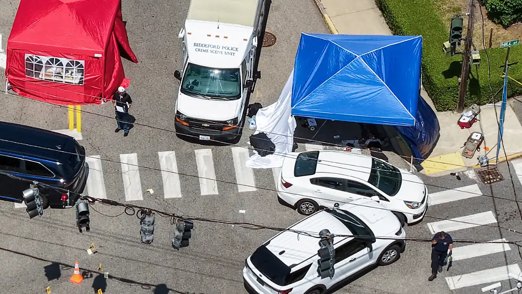 SENSITIVE-MATERIAL-THIS-IMAGE-MAY-OFFEND-OR-DISTURB-A-drone-view-shows-a-person-who-was-fatally-shot-in-an-incident-involving-U-S-Immigration-and-Customs-Enforcement-ICE-lying-under-a-tent-set-up-at-the-scene-in-Biddeford-Maine-U-S-July-13-2026