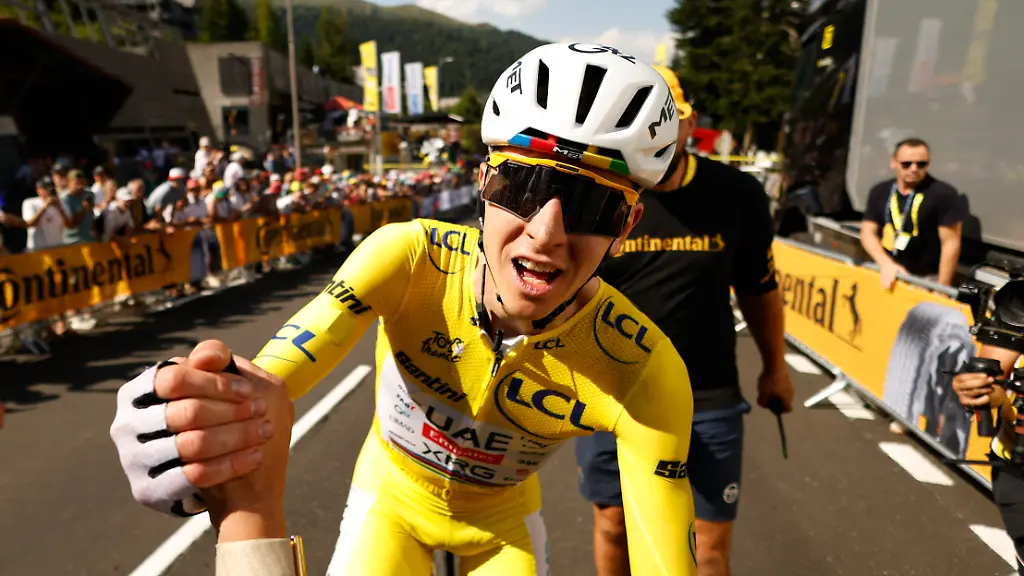 Cycling-Tour-de-France-Stage-10-Aurillac-to-Le-Lioran-Le-Lioran-France-July-14-2026-UAE-Team-Emirates-XRG-s-Tadej-Pogacar-wearing-the-yellow-jersey-celebrates-after-winning-stage-10-Pool-via-REUTERS-Yoan-Valat