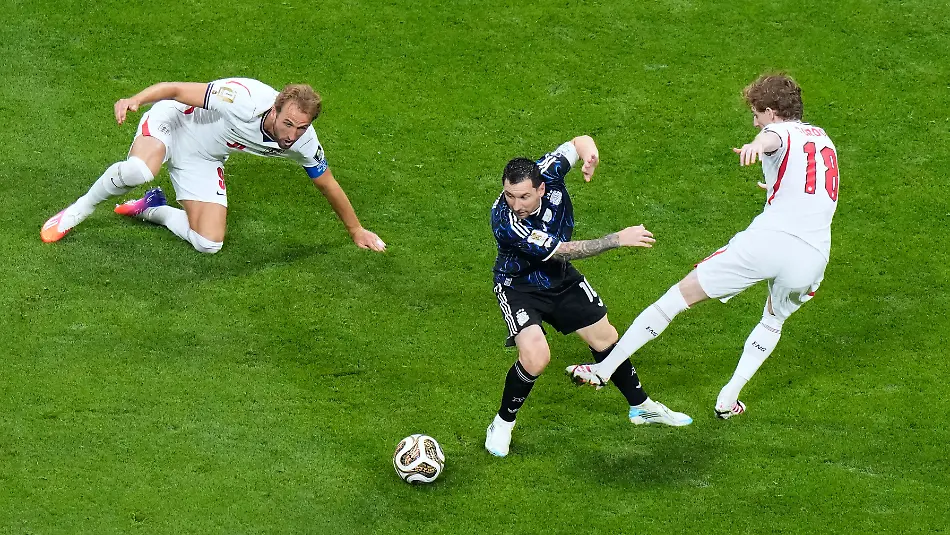 Argentina-s-Lionel-Messi-10-dribbles-between-England-s-Anthony-Gordon-18-and-Harry-Kane-9-during-the-World-Cup-semifinal-soccer-match-in-Atlanta-Wednesday-July-15-2026