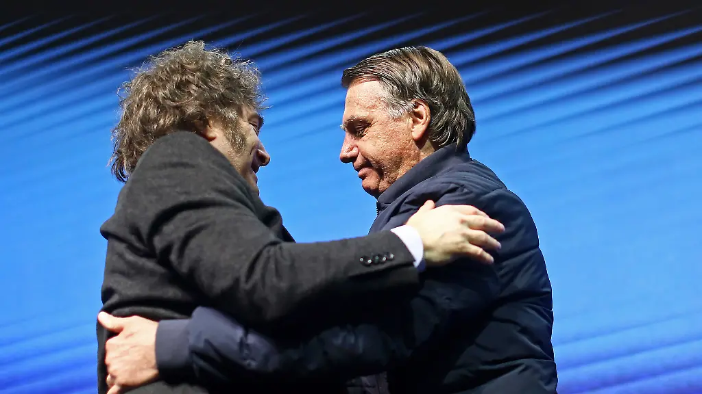 FILE-Argentina-s-President-Javier-Milei-left-hugs-Brazilian-former-President-Jair-Bolsonaro-during-CPAC-Brasil-2024-a-conservative-event-in-Balneario-Camboriu-Santa-Catarina-state-Brazil-July-7-2024