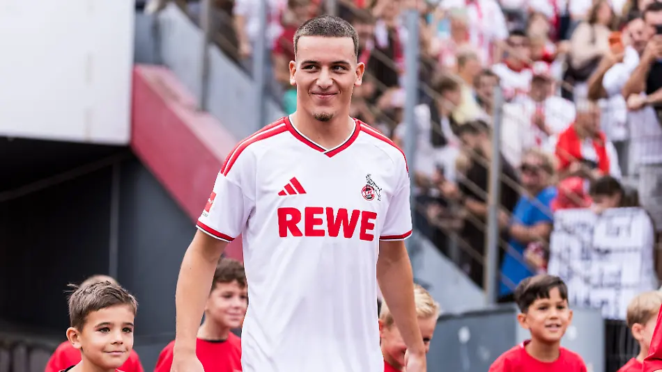 COLOGNE-GERMANY-JULY-18-Said-El-Mala-1-FC-Koeln-13-walking-in-with-a-crowd-of-mascots-before-the-first-friendly-game-of-season-2026-27-between-1-FC-Koeln-vs-FC-Rheinsued-Koeln-at-Suedstadion-on-July-18-2026-in-Cologne-Germany