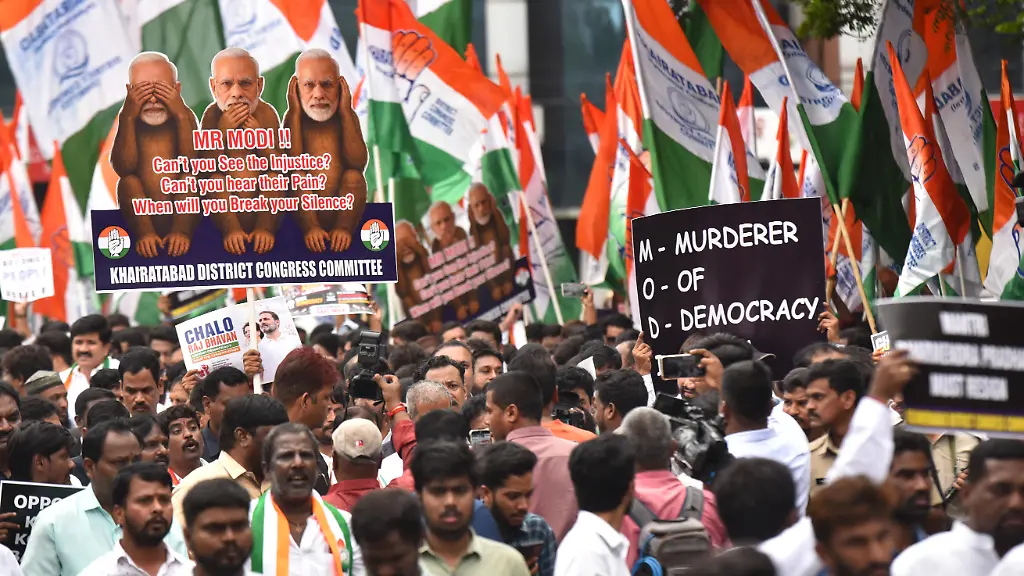 Members-of-the-Indian-National-Congress-carry-cutouts-depicting-India-s-Prime-Minister-Narendra-Modi-and-other-cabinet-ministers-during-a-march-to-Lok-Bhavan-in-Hyderabad-Telangana-India-on-July-22-2026-Protesters-gathered-to-oppose-the-detention-of-Leader-of-Opposition-Rahul-Gandhi-during-a-protest-in-New-Delhi-earlier-today