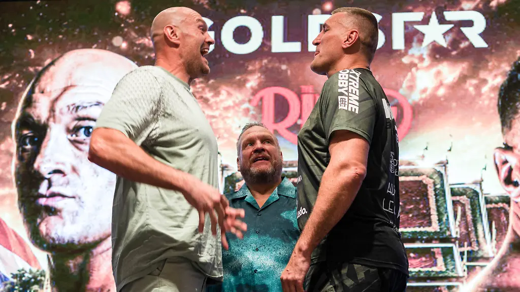 Tyson-Fury-and-Mariusz-Wach-face-off-during-the-official-press-conference-PK-Pressekonferenz-in-Pattaya-Thailand-22-Jul-2026-Tyson-Fury-L-and-Mariusz-Wach-R-face-off-during-the-official-press-conference-ahead-of-their-heavyweight-contest-Former-heavyweight-world-champion-Tyson-Fury-and-Poland-s-Mariusz-Wach-held-the-official-press-conference-ahead-of-their-heavyweight-contest-for-the-WBC-World-Boxing-Council-Humanitarian-Title-It-s-promoted-by-Gold-Star-and-will-take-place-at-Max-Muay-Thai-Arena-in-Pattaya-Thailand-with-proceeds-supporting-the-Father-Ray-Foundation