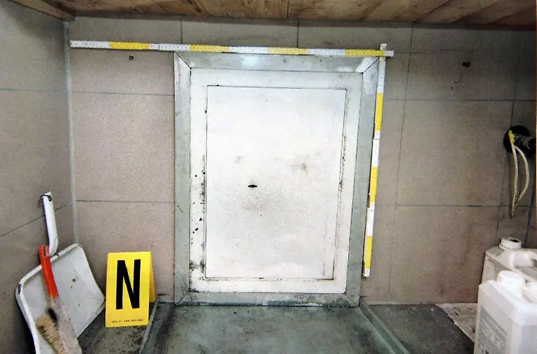 This-copy-of-a-police-handout-image-released-on-Thursday-24-August-shows-the-entry-door-to-the-cellar-where-Natascha-Kampusch-was-kept-while-she-was-kidnapped-An-18-year-old-girl-who-miraculously-turned-up-alive-after-she-had-been-held-captive-for-eight-years-was-identified-as-the-missing-Natascha-Kampusch-on-Thursday-Police-said-a-medical-examination-showed-a-scar-on-the-same-place-on-her-body-as-Natascha-had-had-when-she-vanished-aged-10-in-March-1998-The-police-statement-came-after-a-drama-on-Wednesday-in-which-Natascha-escaped-from-a-car-driven-by-her-kidnapper-The-44-year-old-man-abandoned-the-car-and-hours-later-committed-suicide-by-throwing-himself-under-a-train
