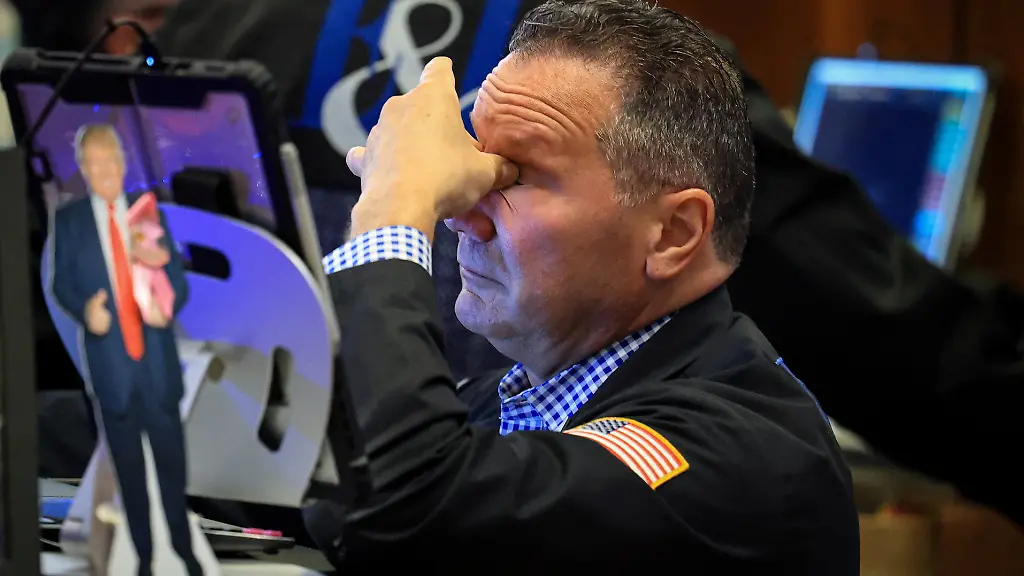 A-trader-works-on-the-floor-at-the-New-York-Stock-Exchange-NYSE-in-New-York-City-U-S-July-23-2026