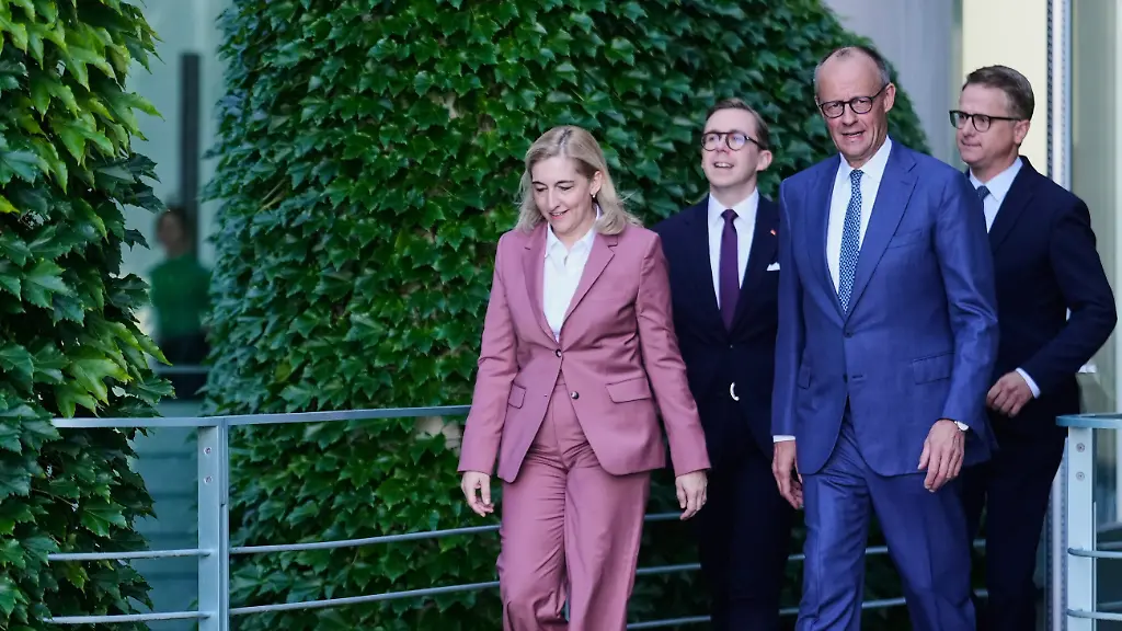 Chancellor-Friedrich-Merz-second-from-right-arrives-with-Nina-Warken-left-Philipp-Amthor-second-from-left-and-Carsten-Linnemann-right-for-statement-about-planned-personnel-changes-in-his-government-at-the-chancellery-in-Berlin-Germany-Friday-July-24-2026