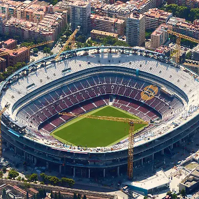 260618-BARCELONA-June-18-2026-An-aerial-photo-taken-on-June-18-2026-shows-the-Camp-Nou-stadium-in-Barcelona-Spain-Barcelona-displays-its-distinctive-grid-layout-with-the-Sagrada-Familia-Basilica-rising-prominently-among-the-city-blocks-Designed-by-urban-planner-Ildefons-Cerda-in-the-19th-century-the-grid-structure-continues-to-shape-the-development-and-identity-of-the-Mediterranean-city