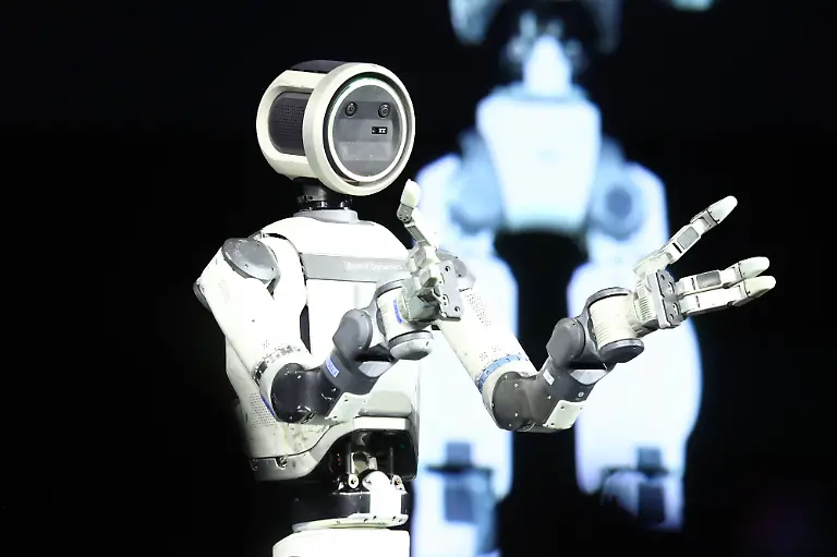 The-ATLAS-prototype-robot-by-Boston-Dynamics-makes-an-appearance-on-stage-during-a-press-conference-at-the-2026-International-CES-at-the-Mandalay-Bay-Convention-Center-in-Las-Vegas-Nevada-on-Monday-January-5-2026