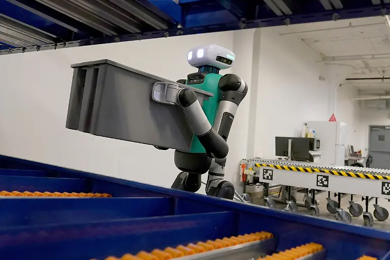 FILE-Agility-Robotics-warehouse-robot-Digit-performs-maneuvers-at-the-company-s-office-in-Pittsburgh-on-Aug-16-2023