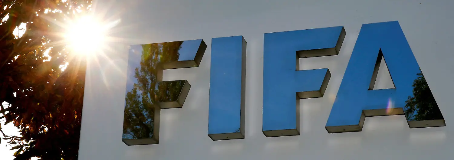 FILE-PHOTO-The-logo-of-FIFA-is-seen-in-front-of-its-headquarters-in-Zurich-Switzerland-September-26-2017