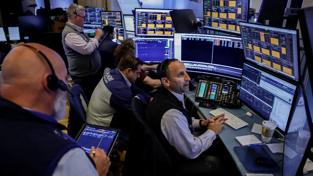 Traders-work-on-the-floor-of-the-New-York-Stock-Exchange-NYSE-in-New-York-City-U-S-July-31-2026