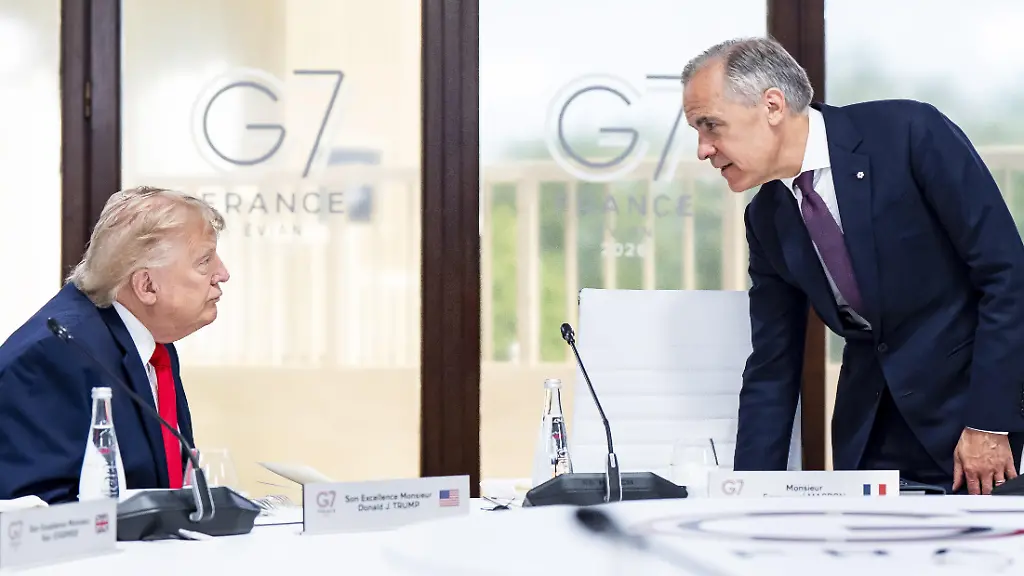 THE-CANADIAN-PRESS-2026-06-16-Prime-Minister-Mark-Carney-and-U-S-President-Donald-Trump-speak-at-the-G7-working-luncheon-in-Evian-les-Bains-France-on-Tuesday-June-16-2026