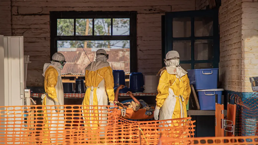 260624-KINSHASA-June-24-2026-Xinhua-Medical-workers-escort-an-Ebola-patient-to-an-Ebola-treatment-center-in-Mongbwalu-Ituri-Province-the-Democratic-Republic-of-the-Congo-June-20-2026-The-Democratic-Republic-of-the-Congo-DRC-has-reported-1-094-confirmed-Ebola-cases-including-277-deaths-in-the-current-outbreak-declared-on-May-15-with-the-World-Health-Organization-WHO-registering-a-record-first-month-caseload-Official-data-released-Tuesday-showed-387-cases-were-under-quarantine-or-receiving-treatment-and-115-recoveries-DRC-authorities-have-also-reported-131-suspected-cases-including-44-suspected-deaths