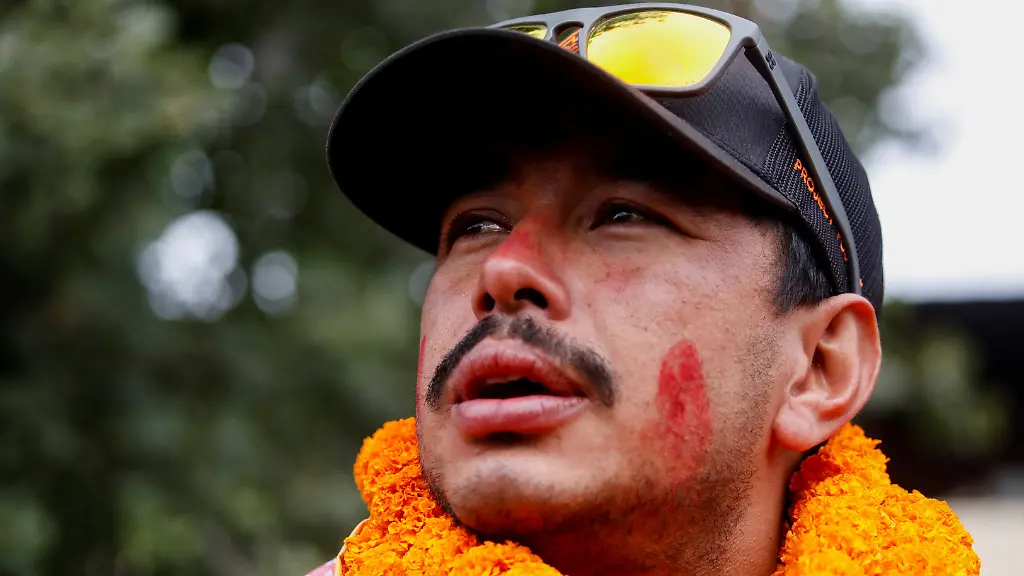 Nirmal-Purja-who-became-the-fastest-person-to-summit-the-world-s-14-highest-mountains-speaks-with-the-media-upon-his-arrival-at-Tribhuvan-International-Airport-in-Kathmandu-Nepal-October-30-2019-Picture-taken-October-30-2019